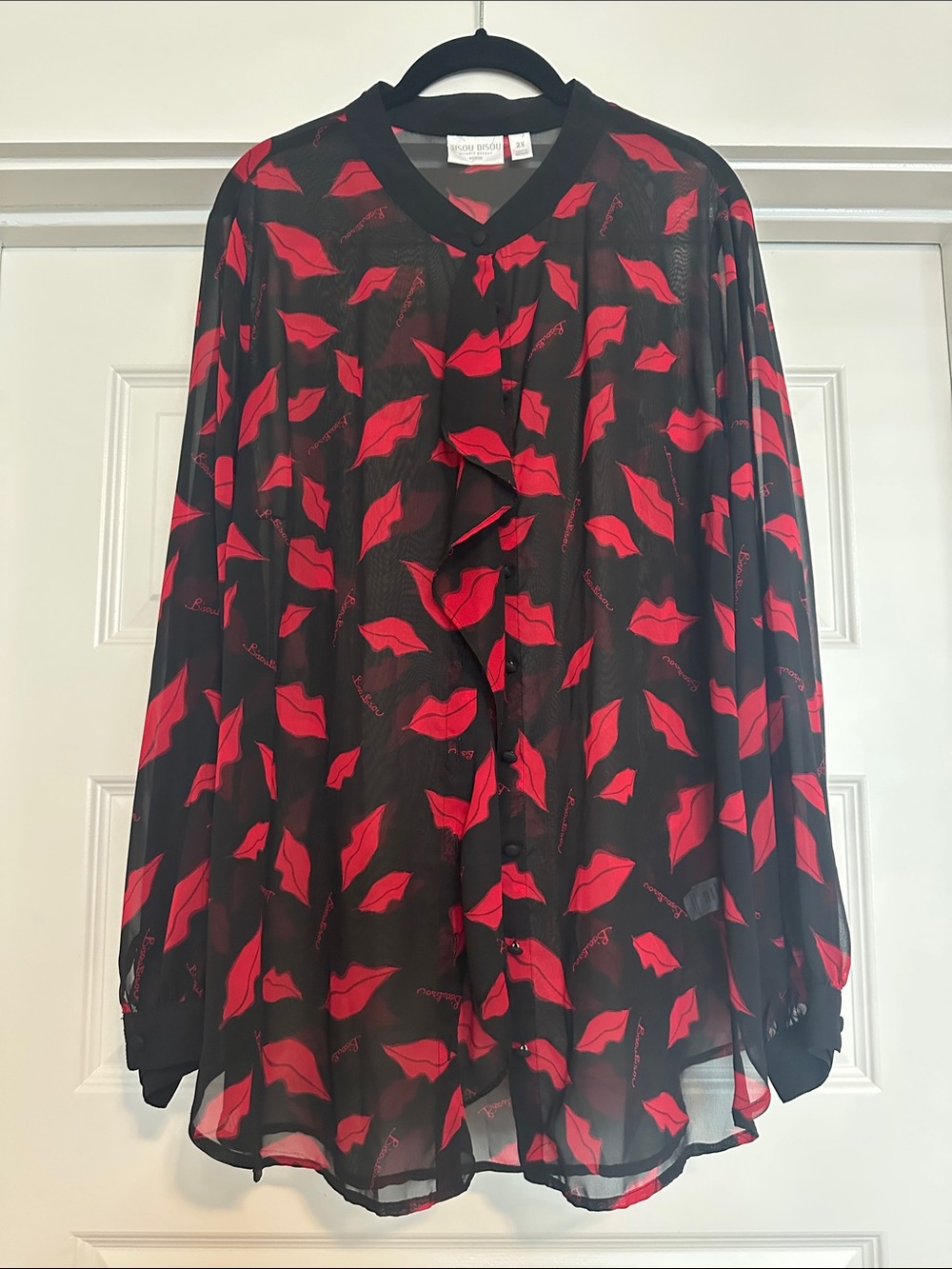 Bisou Bisou Black Blouse with Red Lip Print and Ruffle Front